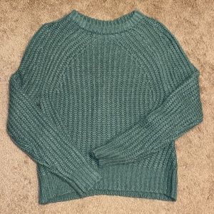 green sweater